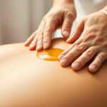 Hands applying oil during a personalized massage.